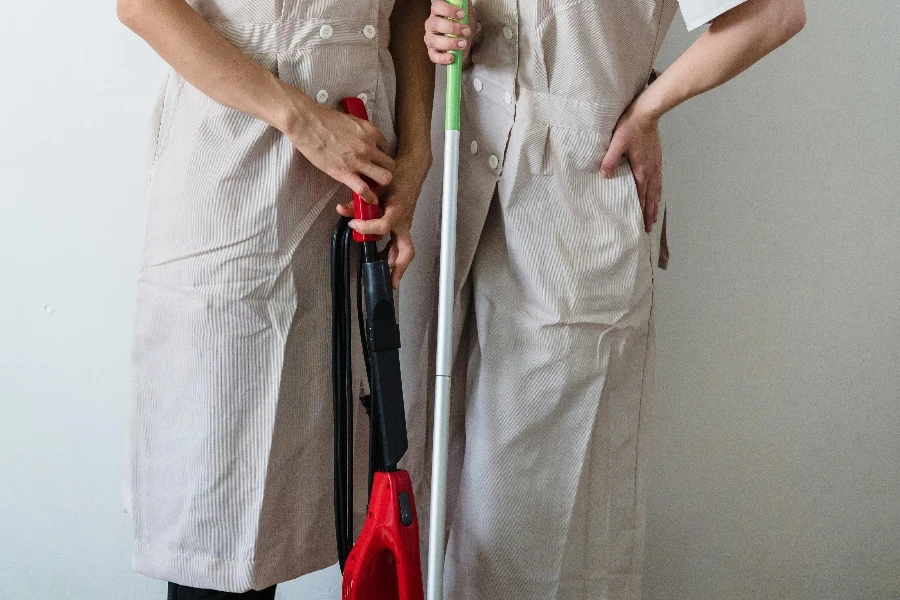 Cleaners Wearing Their Uniforms and Badges