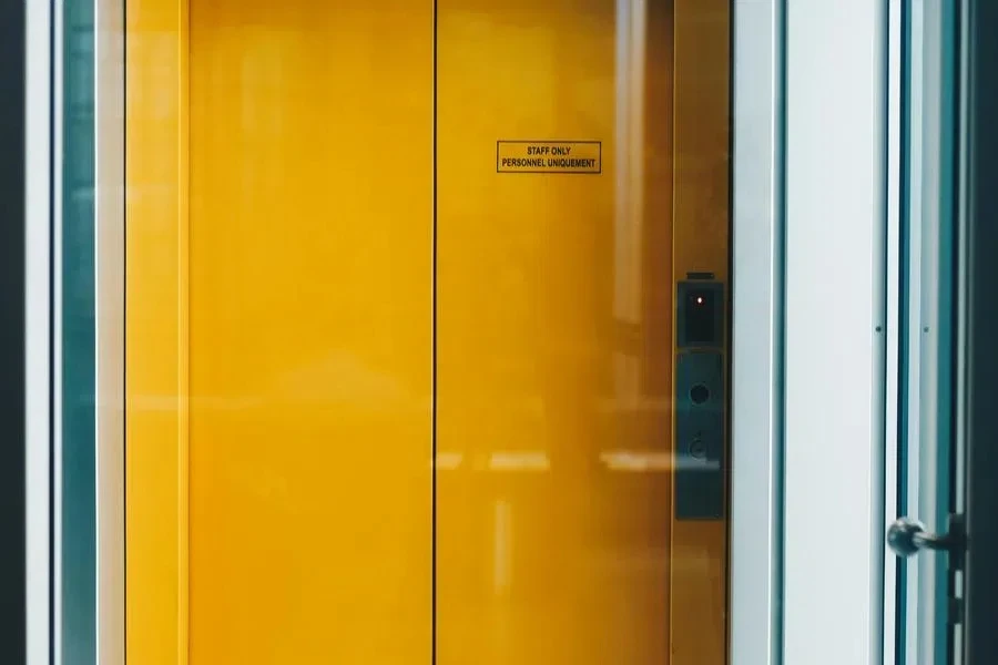 Closed Yellow Elevator Door by Martin Péchy