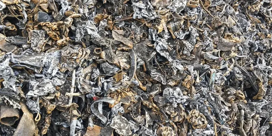 Closeup view of office paper shredder teeth