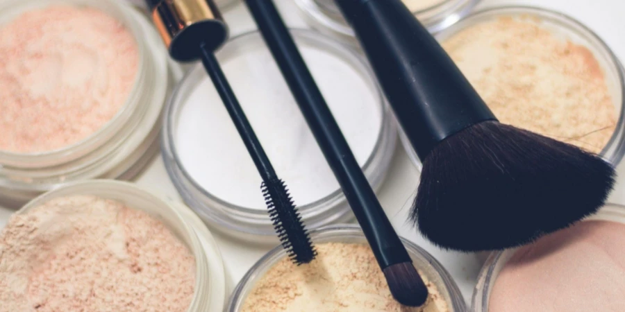 Compact Powders and Brushes for Makeup Application