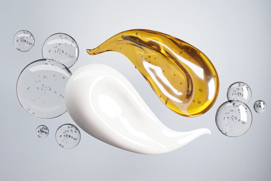 Cream and Essence oil mixed surrounded by warter bubbles on a white background.-3d rendering