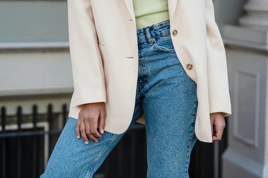 Crop Stylish Woman in Jacket on City Street