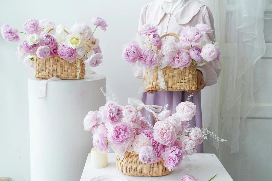 Delicate flower arrangements in baskets