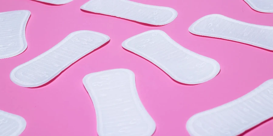 Feminine hygiene pads on a pink background