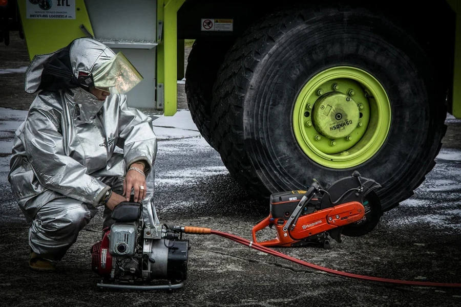 Firefighter Fixing Tires