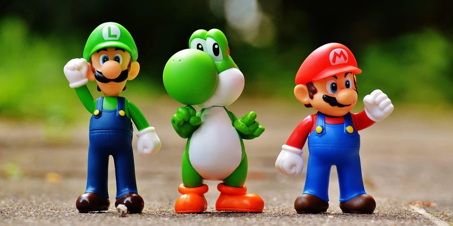 Focus Photo of Super Mario, Luigi, and Yoshi Figurines