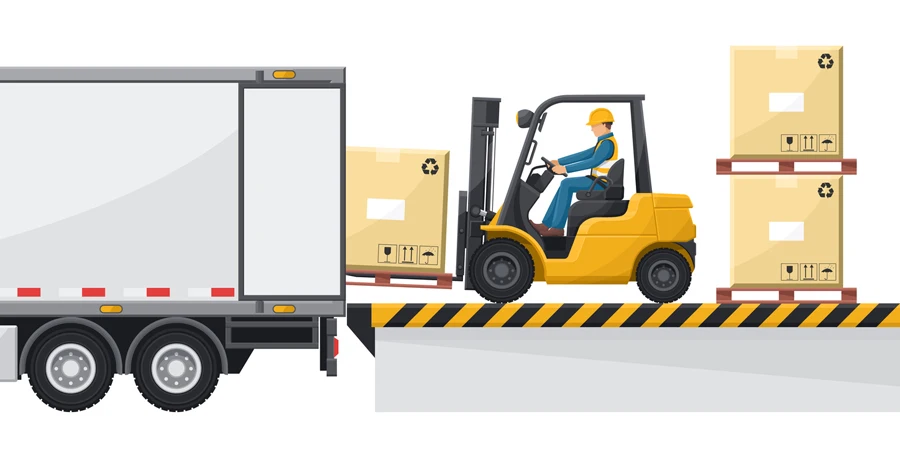 Forklift loading merchandise to a container truck at the loading and unloading dock