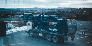 Garbage Truck Parked in Parking Lot