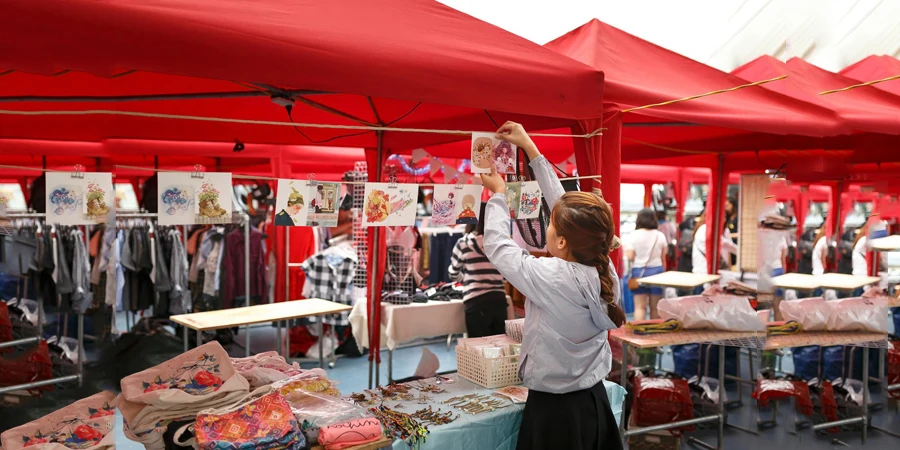 Girl Arranging Displays For Sale