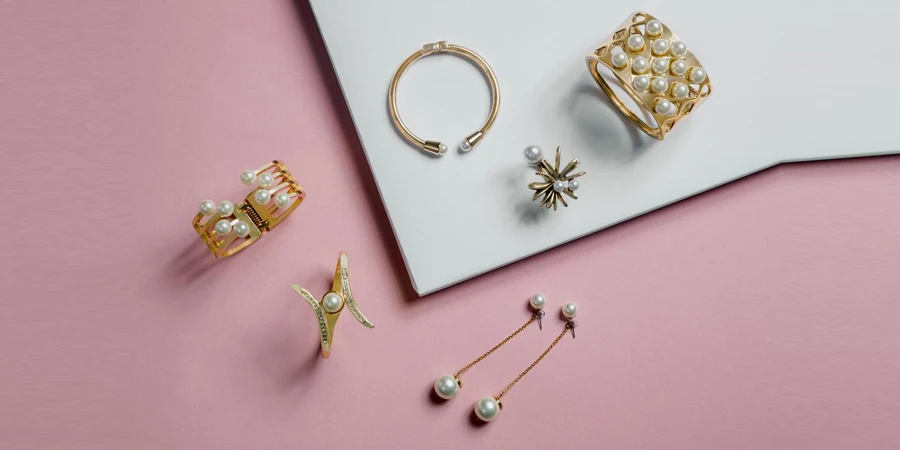 Golden bracelets and earrings with pearls