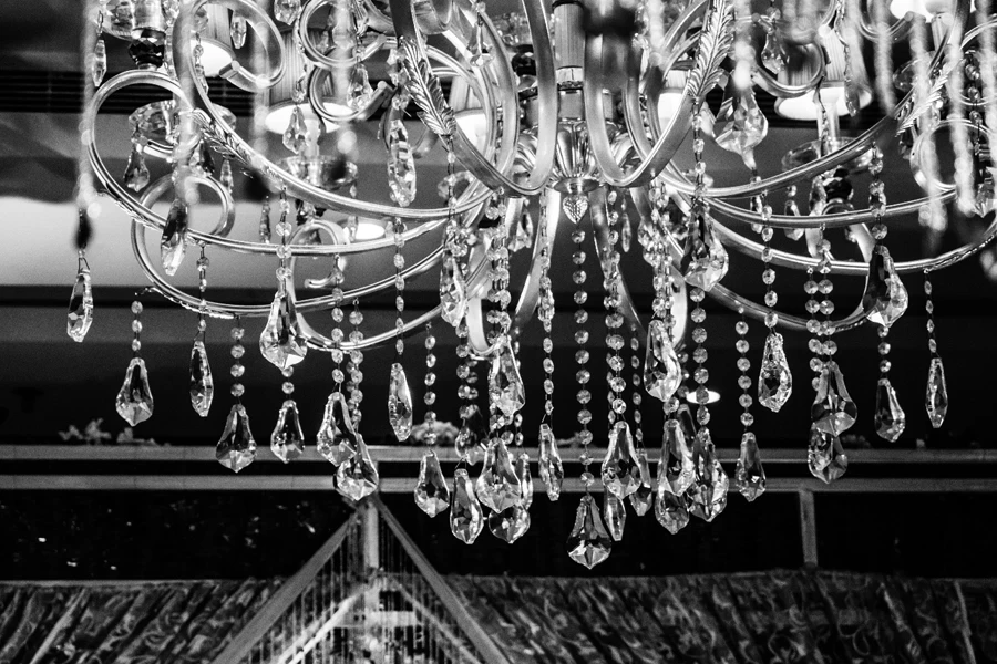 Grayscale Photo of Glass Chandelier