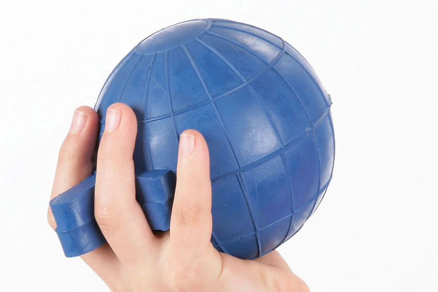 Hand holding a blue javelin throwing ball