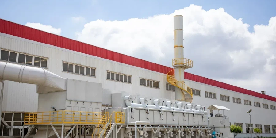 Industrial building, the dust collector with clear blue sky background