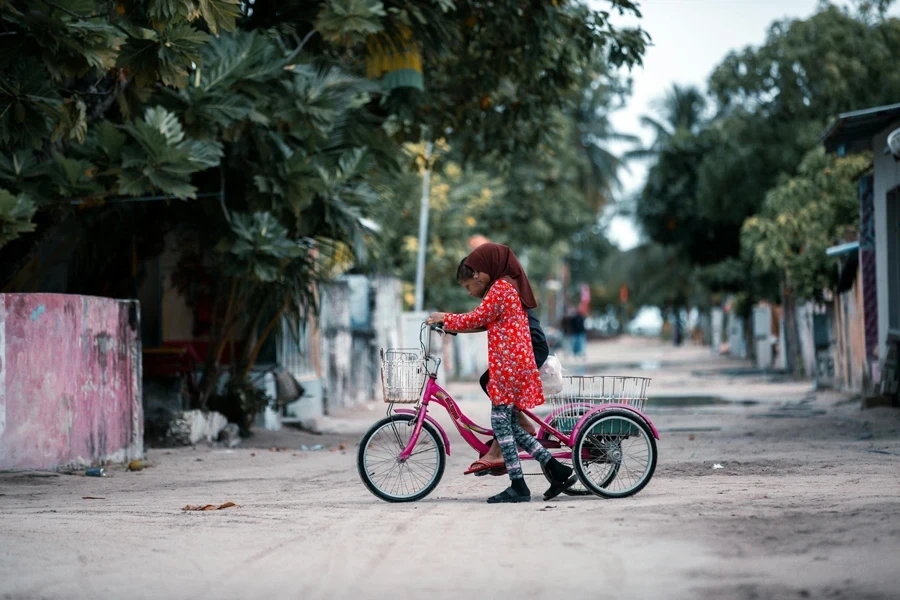 Kids Riding a Tricycle