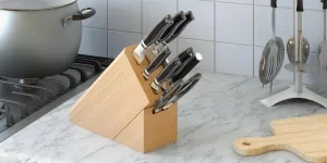 Kitchen knives with wooden block on the kitchen desk