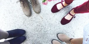 Ladies wearing different pairs of comfortable shoes