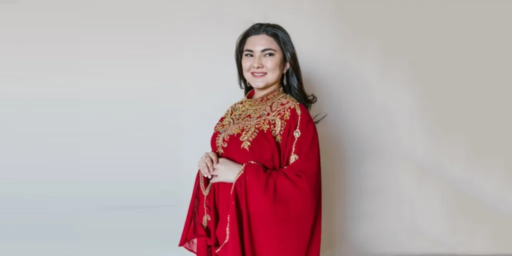 Lady in a formal red kaftan with gold embroidery