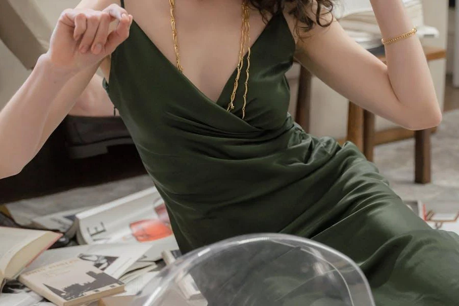 Lady posing in a green formal dress