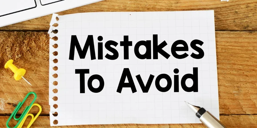 MISTAKES IS AVOID words written in the notebook