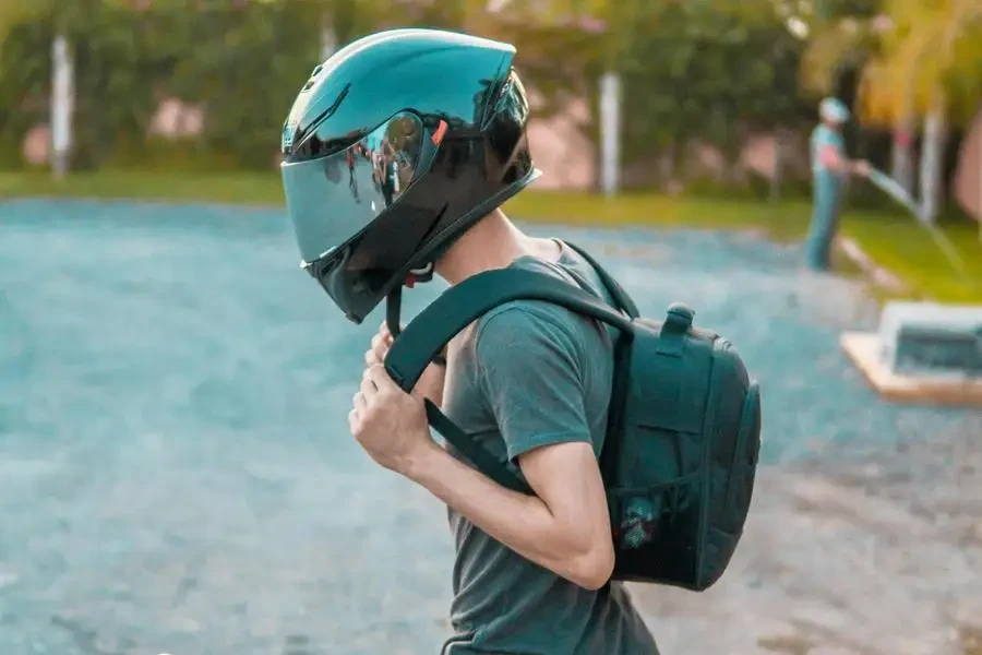 Man Wearing Black Helmet by Hassan OUAJBIR