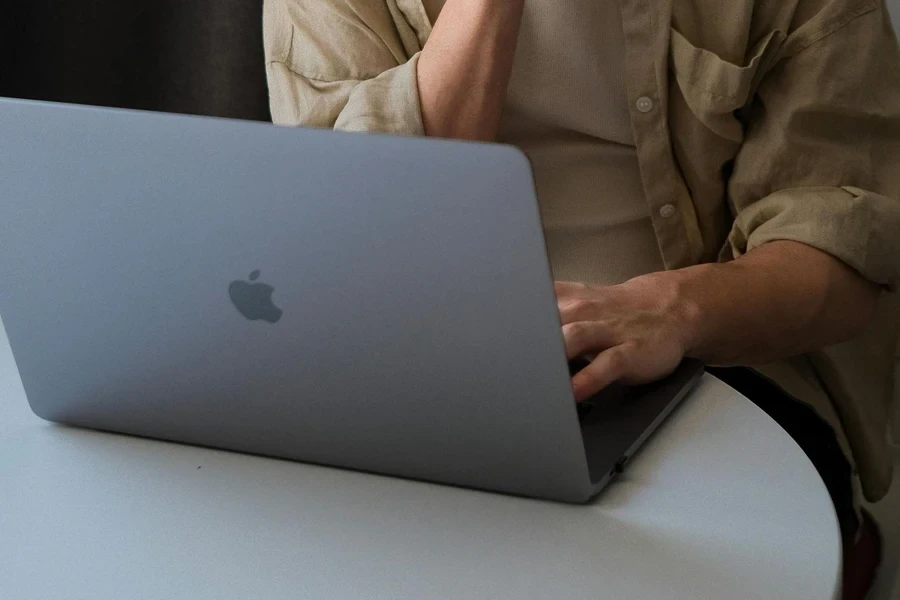 Man crafting copy on his iMac