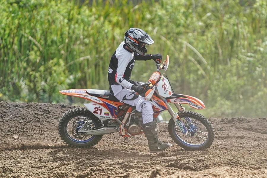 Man in Black Helmet Riding a Motorbike