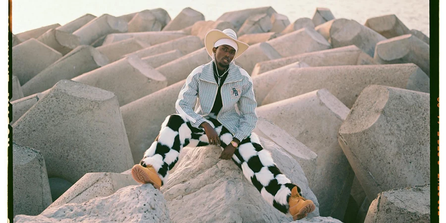 Man in Hat, Shirt and Checkered Trousers