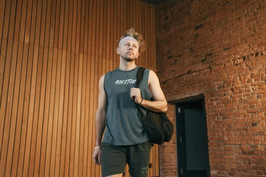 Man in a gray tank top