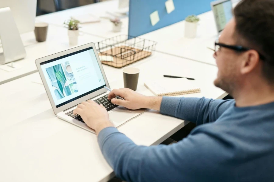 Man in front of his Laptop