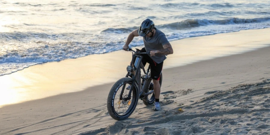 Man on Electric Bike on Beach