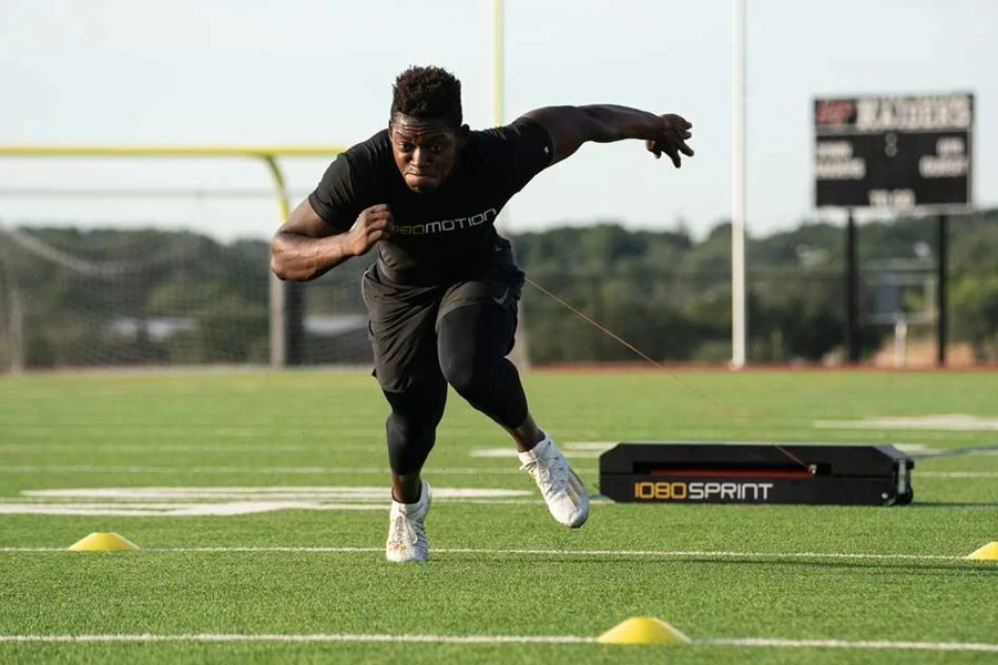 Man overspeed training on a field