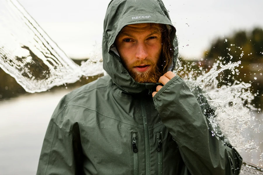 Man wearing waterproof rain jacket