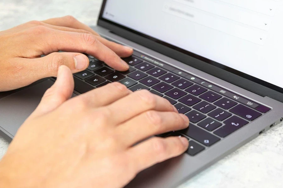 Man working on copy on his laptop