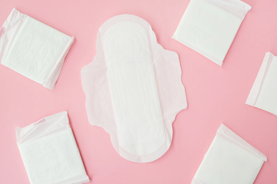 Many sanitary napkin on pink background