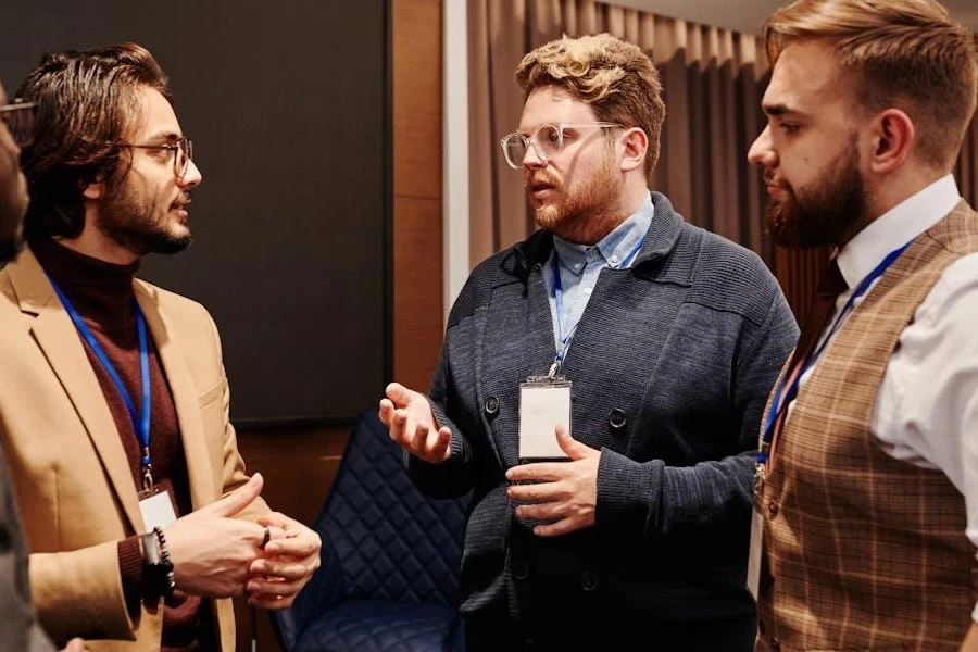 Men discussing after an event