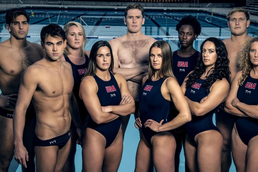 Multiple players in water polo suits
