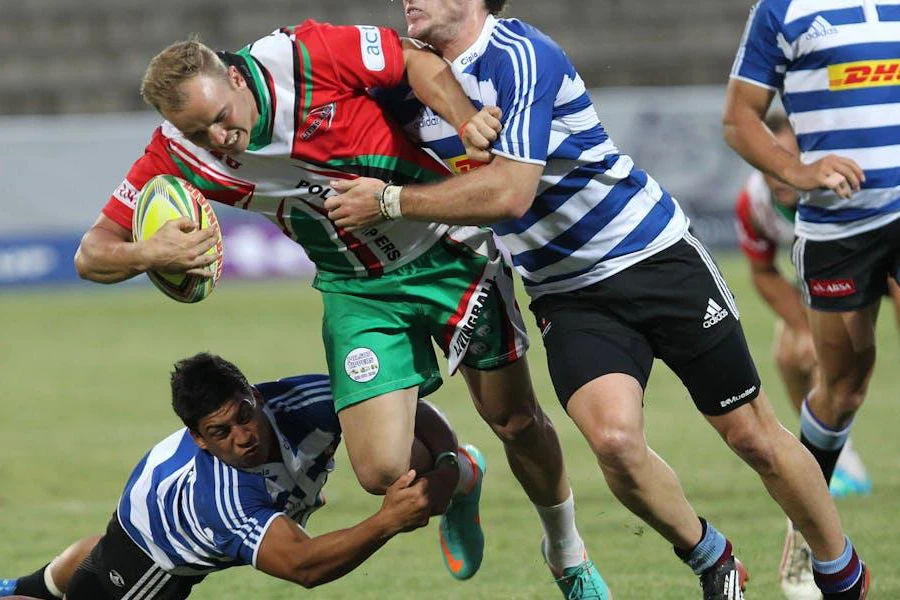 Multiple players wearing rugby jerseys