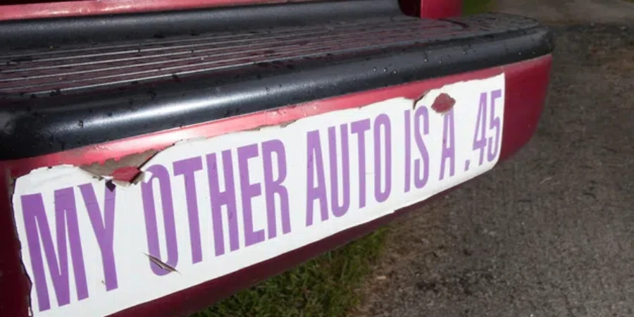 Old bumper sticker owned by a person who has guns