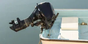 Outboard engine on the plastic boat
