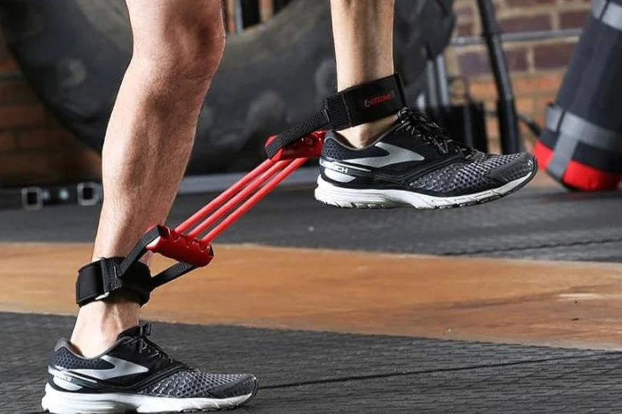 Person using resistance trainers on their legs
