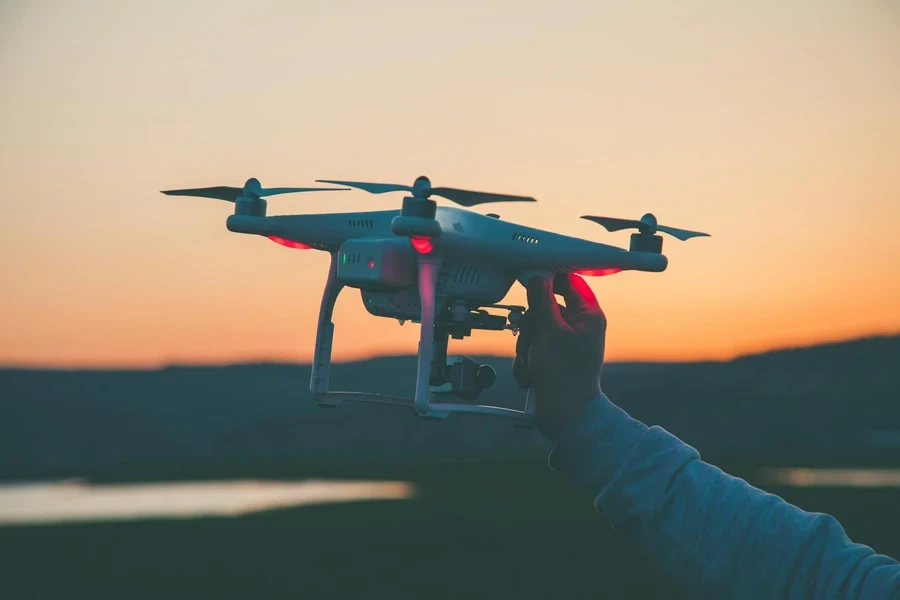 Photo of Person Holding Drone