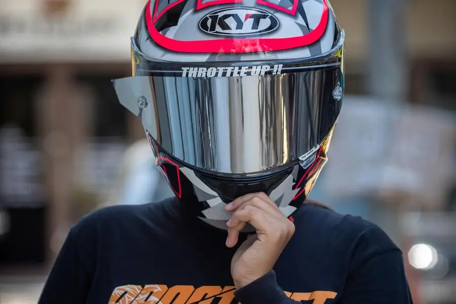 Photo of Person wearing a Motorcycle Helmet by Dwidiyo Hanung