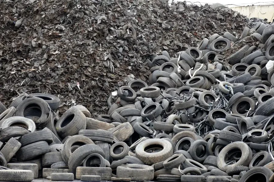 Pile of tires prepared for recycling at the factory