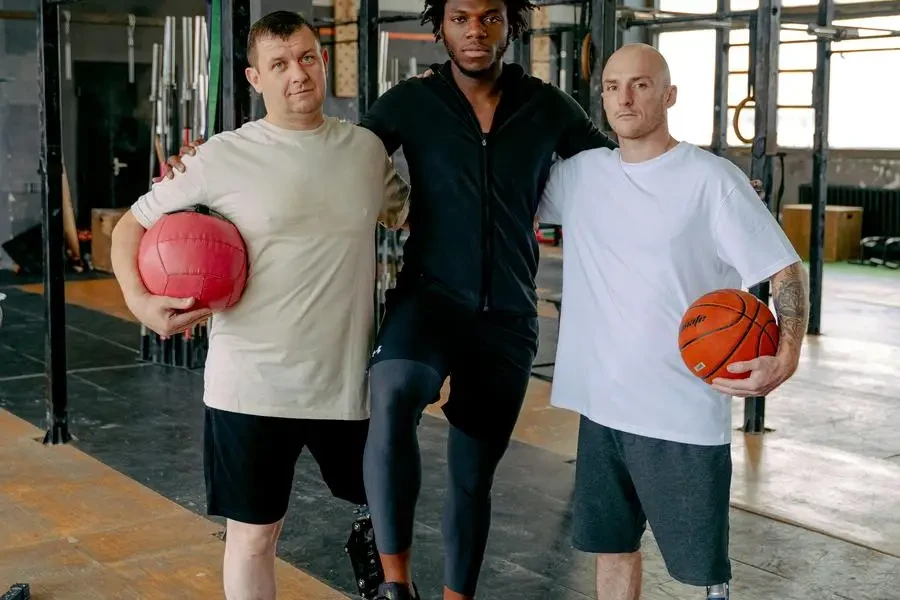 Portrait of Three Men at a Gym by Antoni Shkraba