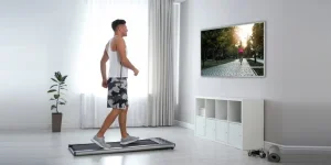 Sporty man training on a walking pad