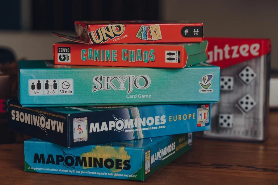 Stack of modern and classing board games on a table