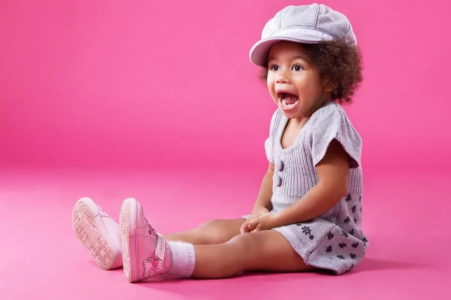 Stylish little girl playing up