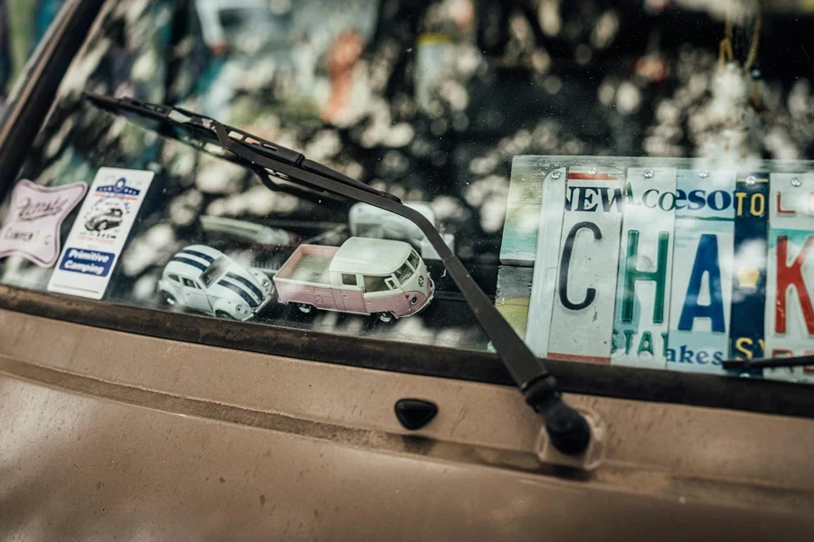 Toy Cars and Stickers on Vehicle Window