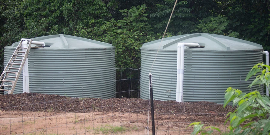 Two assembled Rainwater Storage Tanks on acreage Surrounded