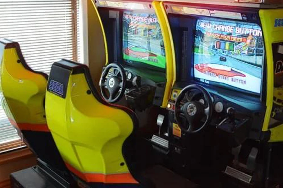 Two driving arcade cabinets in a home